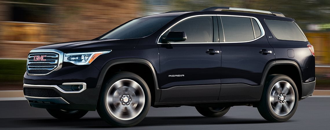The 2018 GMC Acadia on the road in black - Goldstein Buick GMC in Albany, NY and Colonie, NY