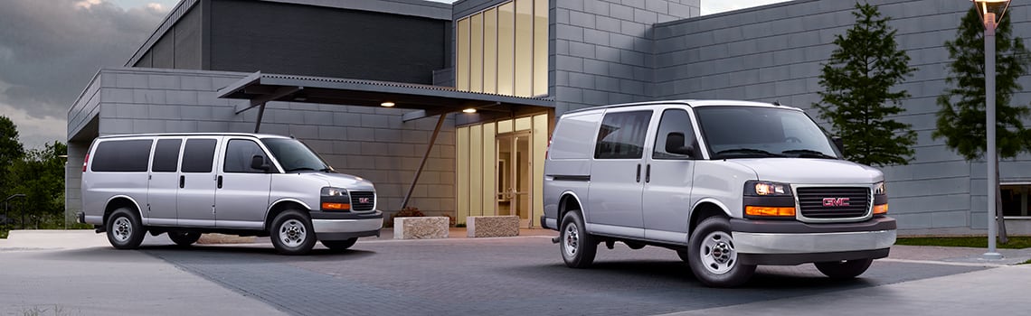 2023 GMC Savana Passenger Vans base and extended version shown in business driveway